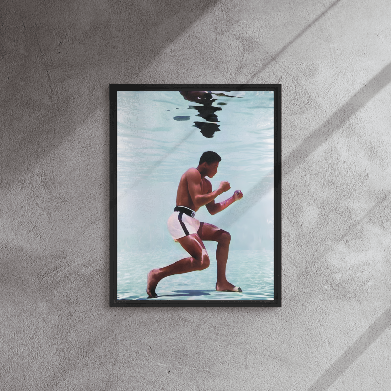 Underwater Poise: Muhammad Ali's Aquatic Grace - Framed Canvas Art